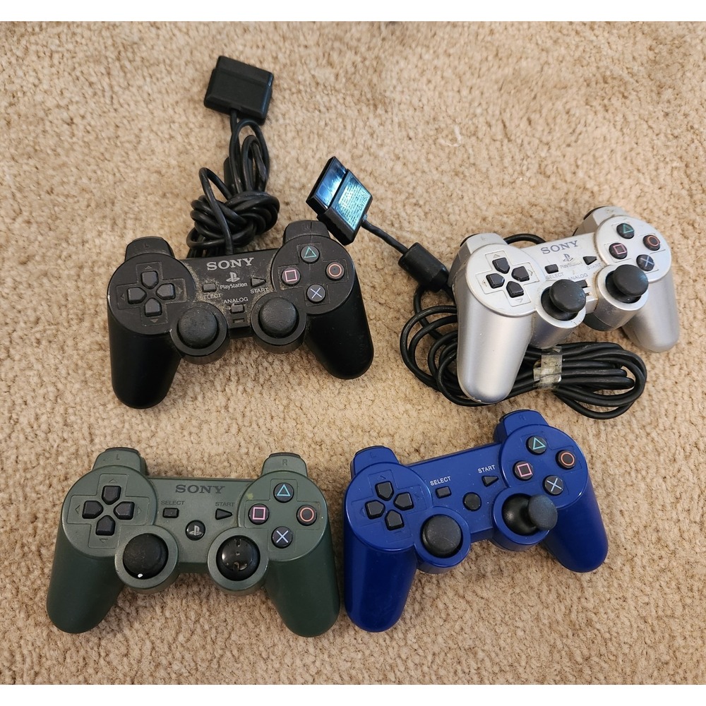 Lot Of 4 PlayStation Controllers BROKEN FOR PARTS